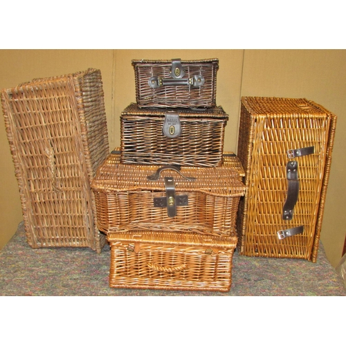 1173 - A group of wicker hampers/baskets, etc (7)