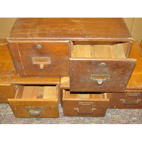 1175 - A group of early 20th century oak and other banks of filing drawers (4)