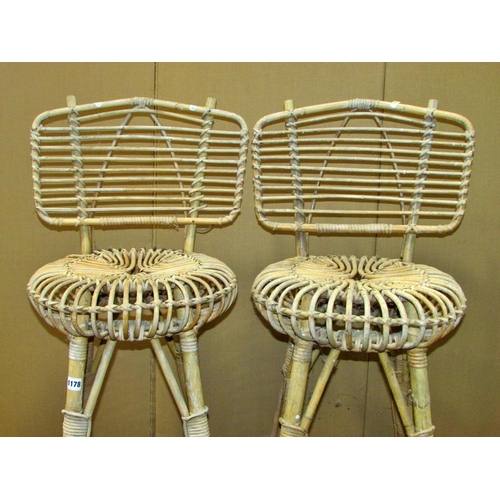 1178 - A pair of high woven bar/counter stools/chairs, 101cm high