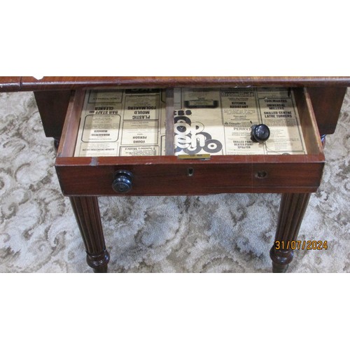 1306 - A Victorian mahogany drop leaf table, raised on fluted legs and brass casters, 75cm high, 86 x 105cm... 