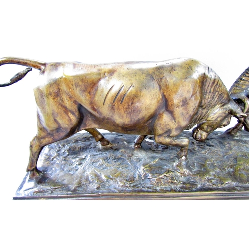 508 - A bronze study of two bulls fighting 51cm wide at plinth base.