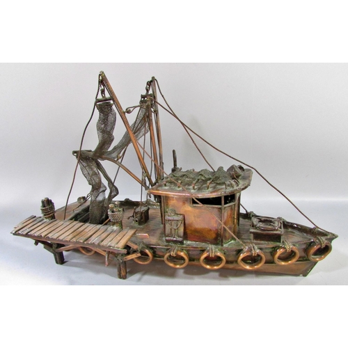 510 - A hand made model copper fishing boat attached to a quay, named Currie & Currie, 45cm long