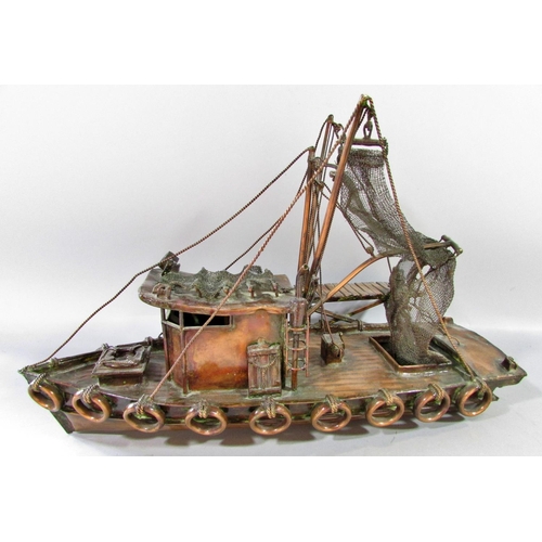 510 - A hand made model copper fishing boat attached to a quay, named Currie & Currie, 45cm long