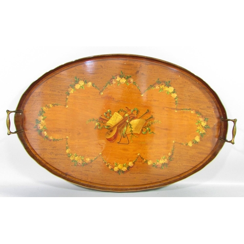 516 - A 19th oval satinwood tray with hand painted musical instruments and floral garlands, raised gallery... 