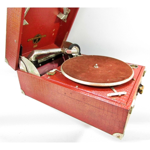 526 - A vintage Columbia No 112a gramophone in a faux crocodile carry case.(Hinge in need of restoration)(... 