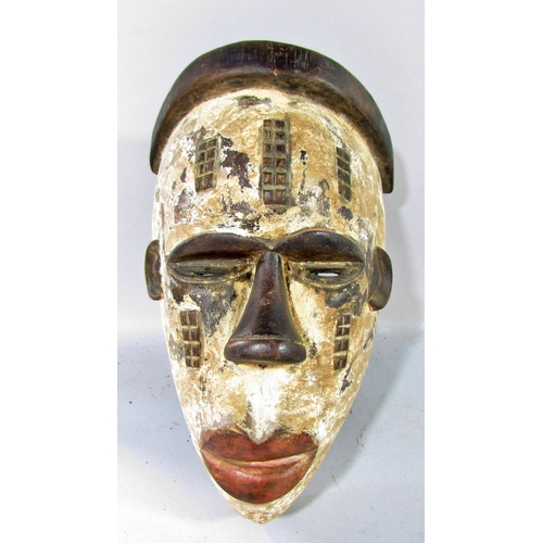 532 - Five African tribal masks from, Cameroon, Ivory Coast and North West Africa