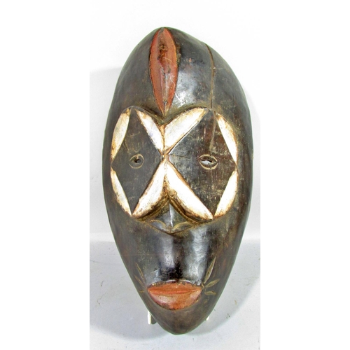 533 - Five African tribal masks from, Cameroon, Ivory Coast and North West Africa