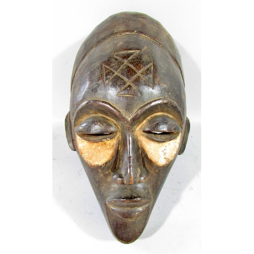 533 - Five African tribal masks from, Cameroon, Ivory Coast and North West Africa