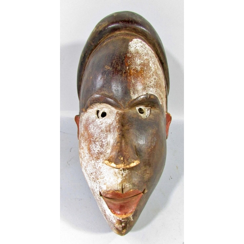 533 - Five African tribal masks from, Cameroon, Ivory Coast and North West Africa