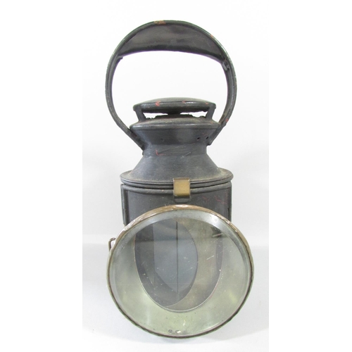 449 - A L.M.S hand lamp, with central rotating red, green, and clear glass lens with the serial number 473... 