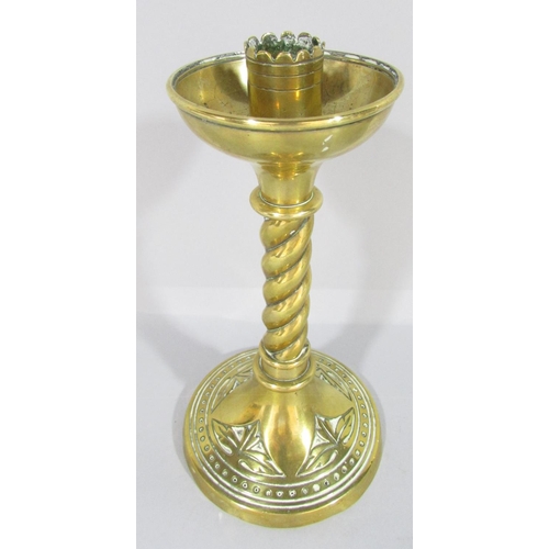 450 - A pair of Victorian brass candlesticks with spiral stem and splayed circular base, 19cm high.