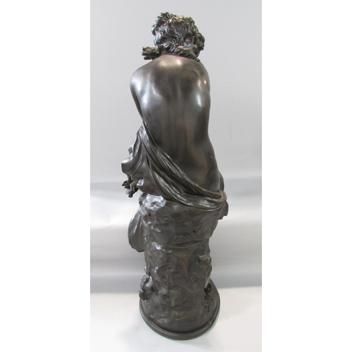 452 - A bronzed resin statuette a shy classical female resting on a stump, after the original signed Morea... 