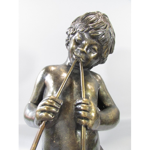 456 - A bronzed plaster boy playing the pipes 76cm high.