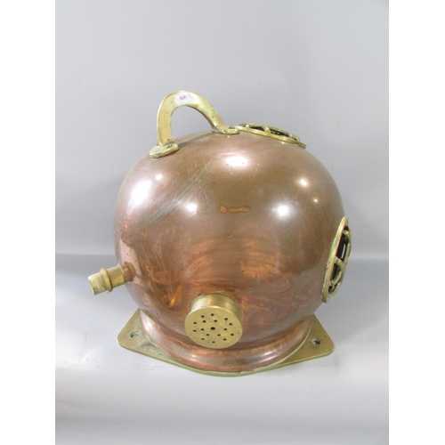 458 - A Vintage copper and brass deep sea diver’s helmet and collar together with a tangle of fairy lights... 