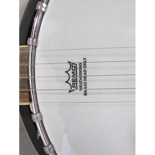 470 - A Washburn B-9 Resonator five string Banjo, mahogany resonator and aluminium ring, barely used with ... 