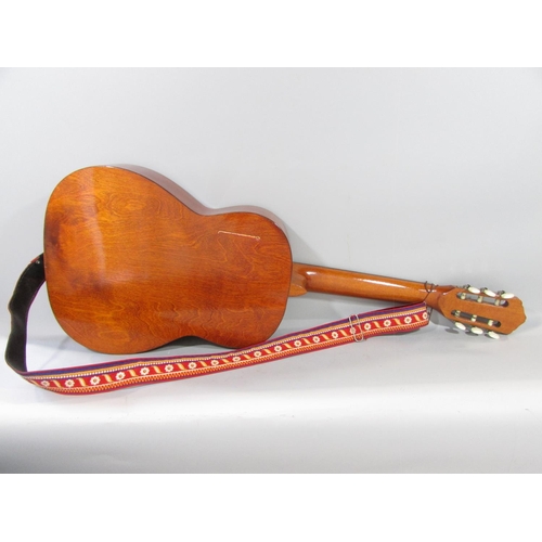 471 - A Tatra Classic Spanish style six string acoustic guitar, made in Czechoslovakia, with a folky strap... 