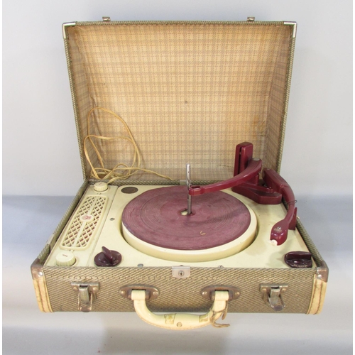 475 - A Collaro Regentone portable three speed record player with stacking arm, circa 1950’s.