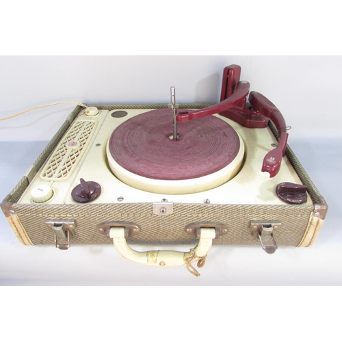 475 - A Collaro Regentone portable three speed record player with stacking arm, circa 1950’s.