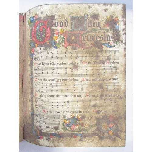 480 - An old Christmas Huntley & Palmers biscuit tin in the form of a hymn book open on the page of “Good ... 