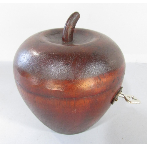 481 - A Pear-wood fruit tea caddy with working lock and key.