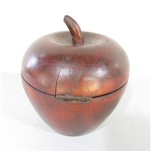 481 - A Pear-wood fruit tea caddy with working lock and key.