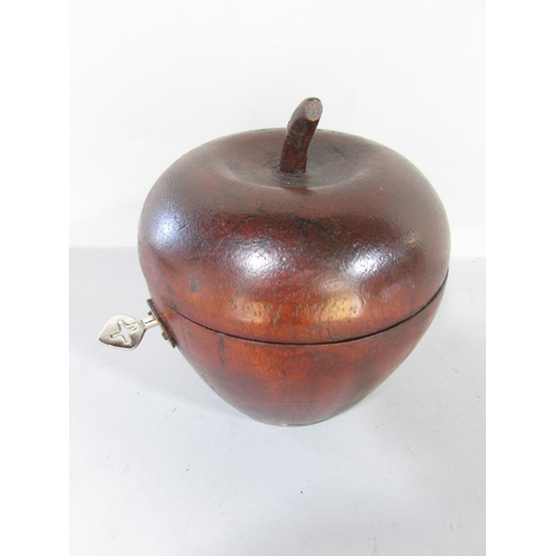 481 - A Pear-wood fruit tea caddy with working lock and key.