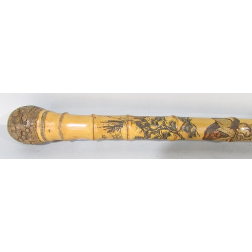 485 - A Chinese decorated bamboo walking stick, an antler handled walking  stick and a vintage shooting st... 