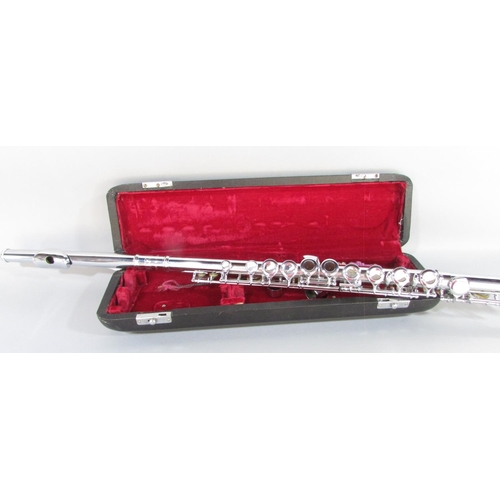 489 - A chrome Parrot three piece flute, with cleaner, made in China, held in a black case.