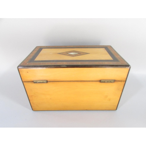 492 - A Victorian satinwood and rosewood inlaid tea caddy with mother of pearl detail and two compartments... 