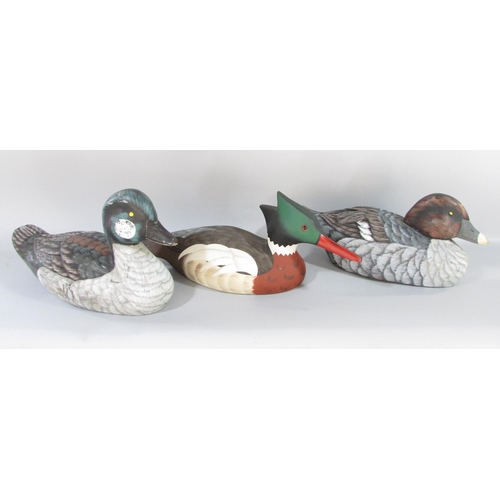 495 - Two Golden Eye hand painted decoy ducks, male and female, and a third Red Breasted Meganser by  Horn... 