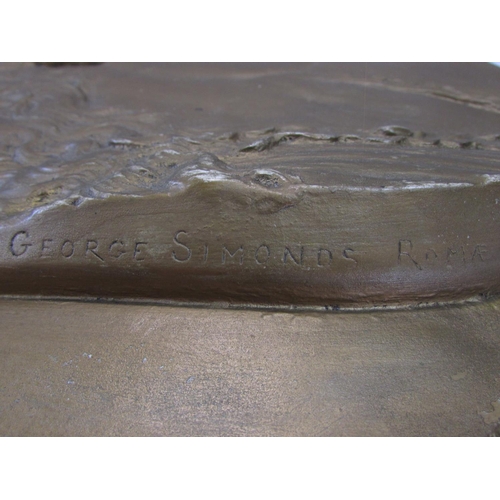 496 - A plaster circular plaque of a profile of a woman in a gold painted finish signed 'George Simonds Ro... 