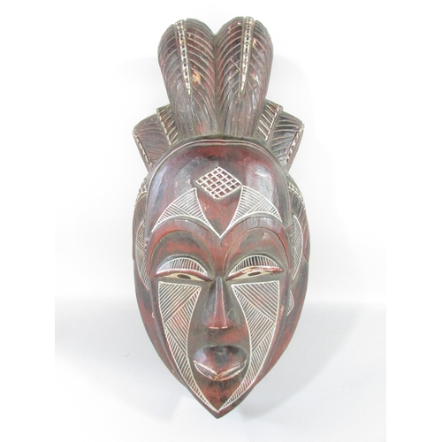 498 - Five African tribal masks from, Cameroon, Ivory Coast and North West Africa.