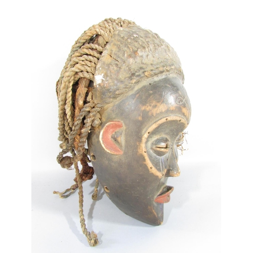 498 - Five African tribal masks from, Cameroon, Ivory Coast and North West Africa.