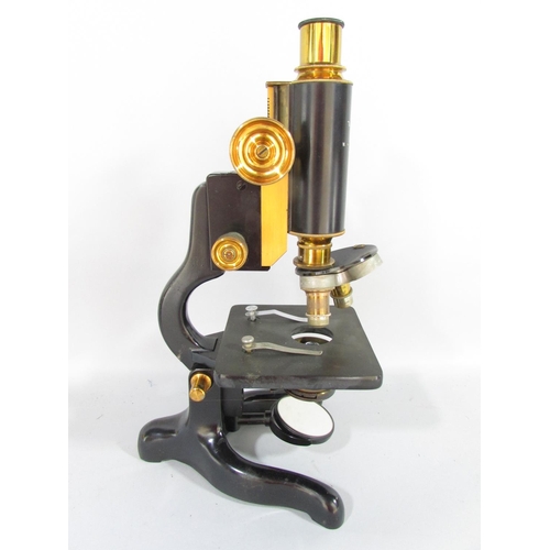 501 - A 1928 W. Watson & Sons Ltd Service microscope serial number 25720, with original mahogany box and k... 