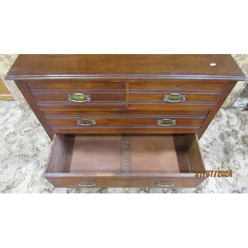 1316 - An Edwardian mahogany chest of two short and two long drawers, 85cm high, 108 x 50cm.