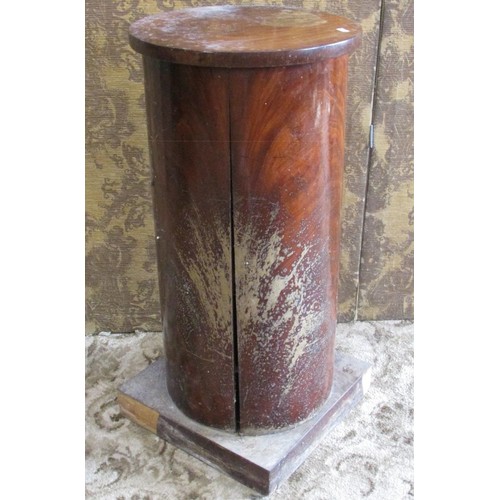 1321 - A Victorian mahogany cylinder pot bedside cupboard, 80cm high, 39cm diameter (AF)