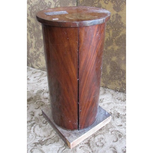 1321 - A Victorian mahogany cylinder pot bedside cupboard, 80cm high, 39cm diameter (AF)