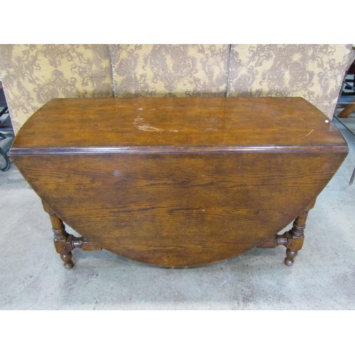 1324 - A large good quality reproduction oak gateleg dining (to seat 12) / wake table, 76 cm high, 205 x 14... 