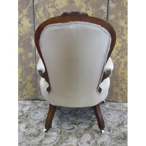 1332 - Two Victorian upholstered walnut elbow chairs (2)