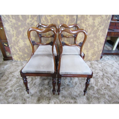 1338 - A set of four Victorian mahogany dining chairs.