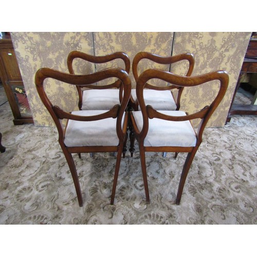 1338 - A set of four Victorian mahogany dining chairs.