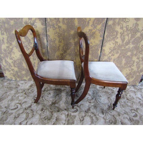 1338 - A set of four Victorian mahogany dining chairs.