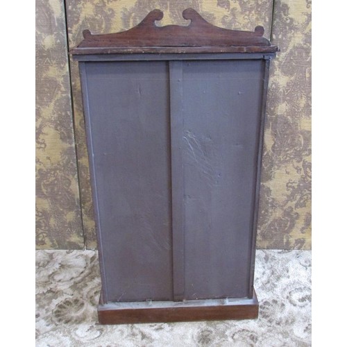 1346 - A small Edwardian mahogany music cabinet, with strung inlaid borders, the hinged panelled door with ... 