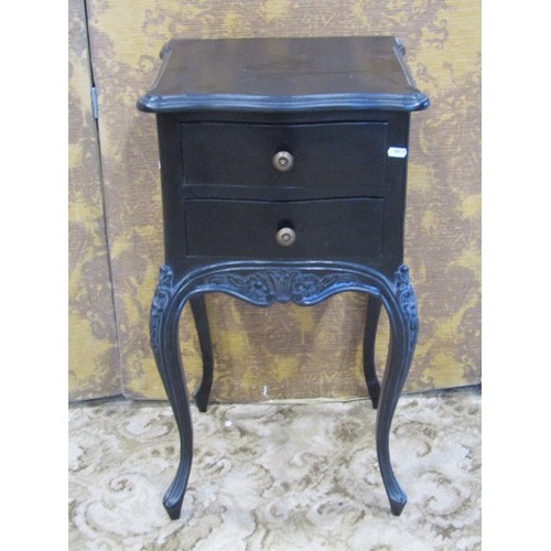 1353 - A reproduction black framed carved upholstered elbow chair together with an associated bedside cupbo... 