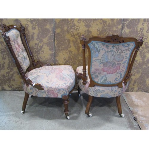 1356 - A pair of Victorian walnut side chairs with upholstered seats and backs (2)