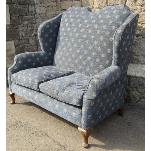 1360 - A good Queen Anne style upholstered high back wing settee, blue fleur de lys covers, raised on short... 