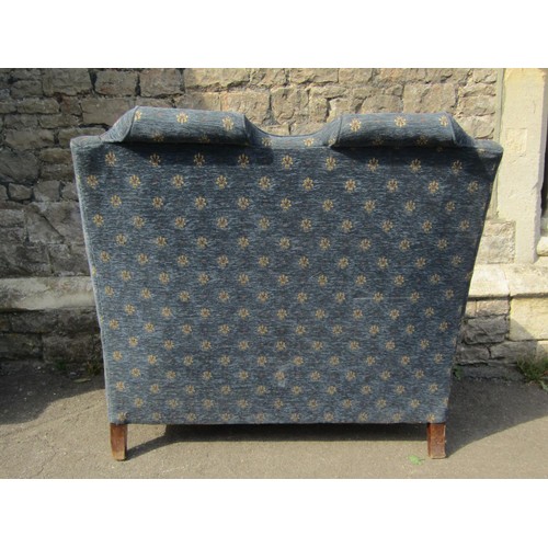 1360 - A good Queen Anne style upholstered high back wing settee, blue fleur de lys covers, raised on short... 