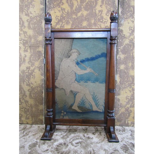 1361 - A stained pine framed firescreen with carved acorn finials enclosing a (earlier) embroidered panel d... 