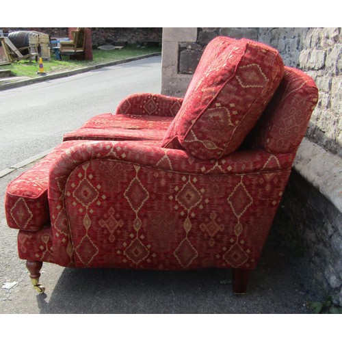 1363 - A good quality Edwardian style red upholstered Kelim style two-seat sofa, raised on turned legs and ... 