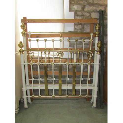 1375 - An Art Nouveau painted ironwork and polished brass double bed frame.